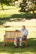 © WavebreakMediaMicro - Elderly man sitting on a bench