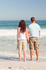 Canvas Print - Lovers walking on the beach