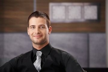 Canvas Print - Portrait of goodlooking businessman smiling