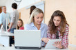 © goodluz - Portrait of teacher and teenage girl in computing class