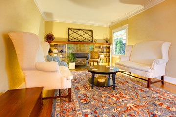 Luxury gold living room with two white sofas