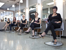 Team Of Hairdressers In A Beauty Salon