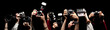 Raised hands holding different photocameras