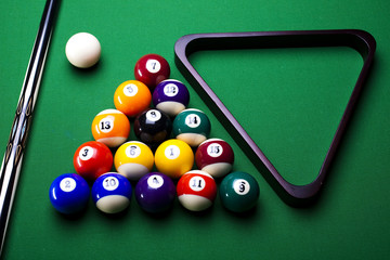 Wall Mural - Pool game balls against a green