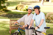 © WavebreakMediaMicro - Mature couple with their bikes