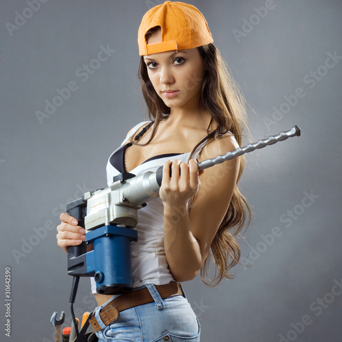 Naklejka nad blat kuchenny sexy young woman construction worker