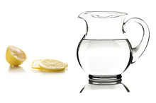 Glass Pitcher With Water And Lemon Slices
