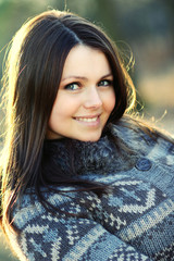 Wall Mural - Portrait of a young smiling woman