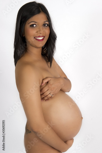 Sexy beautiful pregnant Indian woman in nude smiling - Buy ...