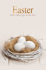 Easter white eggs in the nest