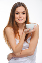 Young happy mixed race woman holding a coffee cup isolated on wh