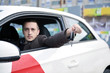 © .shock - man using car navigation