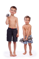 Two boys with dumbbells