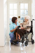 © Monkey Business - Carer With Disabled Senior Woman Sitting In Wheelchair