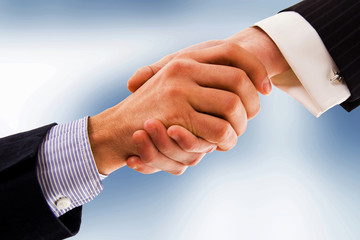 handshake of business partner after the deal