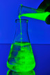 Fluorescence liquid falling in flask