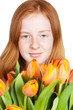 © Ramona Smiers - cute young girl is holding a bunch of tulips