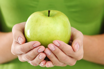 apple in woman hands