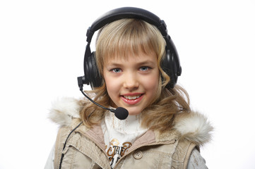 Wall Mural - blond teenage girl in headphones, isolated on white