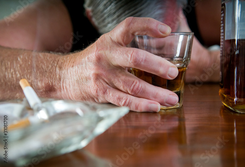 Fotografie, Obraz alcoholism - desperate man with whiskey and cigarettes