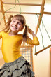 child at her home sports equipment