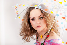 Beautifull Girl Under Polka Dotted Umbrella