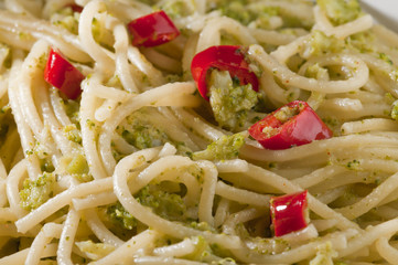 Italian dish of spaghetti with broccoli and hot pepper