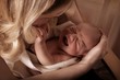 © Image Source - Mother Soothing A Crying Baby