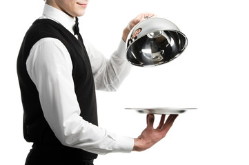 Wall Mural - hands of waiter with cloche lid cover