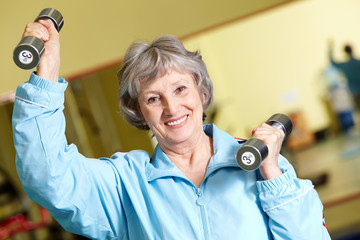 Wall Mural - Exercise with barbells