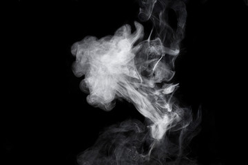 Wall Mural - White smoke on black background. Isolated.