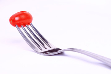 Wall Mural - Tomato on fork