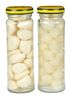 Glass Jars With Marinated Garlic And Onions