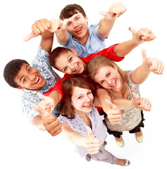 Wall Mural - Top view of young friends with hands raised