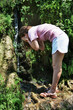 © v_blinov - A girl washes in the stream.