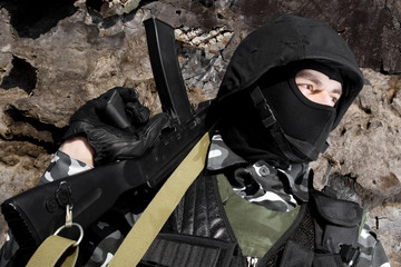 Poster - Portait of a soldier with automatic gun