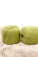 Wall Mural - the green yarn skeins isolated on white