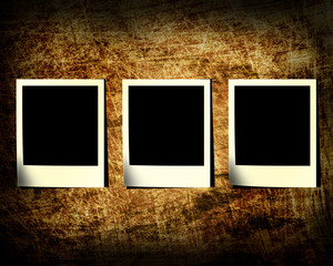 three a photo slide on a grunge background