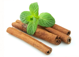 Wall Mural - Sticks of cinnamon with mint