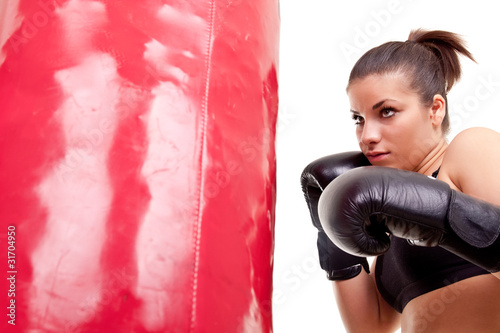girl hitting  boxing bag Fototapete