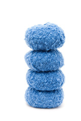 Wall Mural - the blue yarn skeins isolated on white