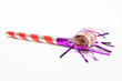 A single party blower on a white background