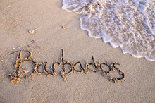 Barbados Sand Writing On A Beautiful Sunset Beach