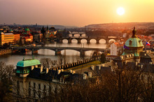 Panoramic View On Charles Bridge And Sunset Prague Lights.