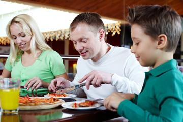 Canvas Print - Eating pizza