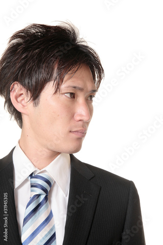 横向きのスーツの男性 Stock Photo Adobe Stock
