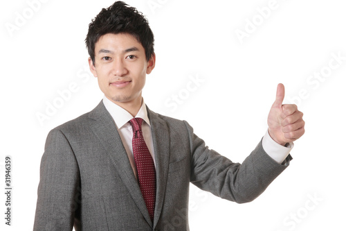 親指を立てるスーツの男性 Stock 写真 Adobe Stock