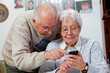 © Ingo Bartussek - senior couple with smartphones