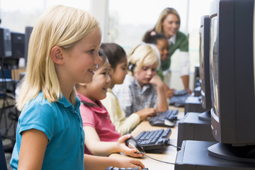 Poster - Kindergarten children learning how to use computers.