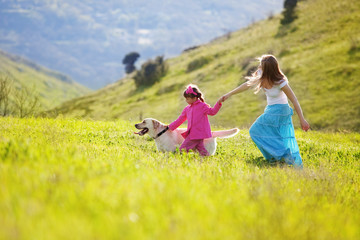 Wall Mural - Happy family walking with dog